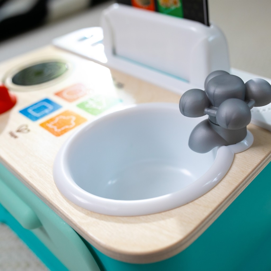 Baby Einstein - MAGIC TOUCH zenélő játékkonyha 3xAA