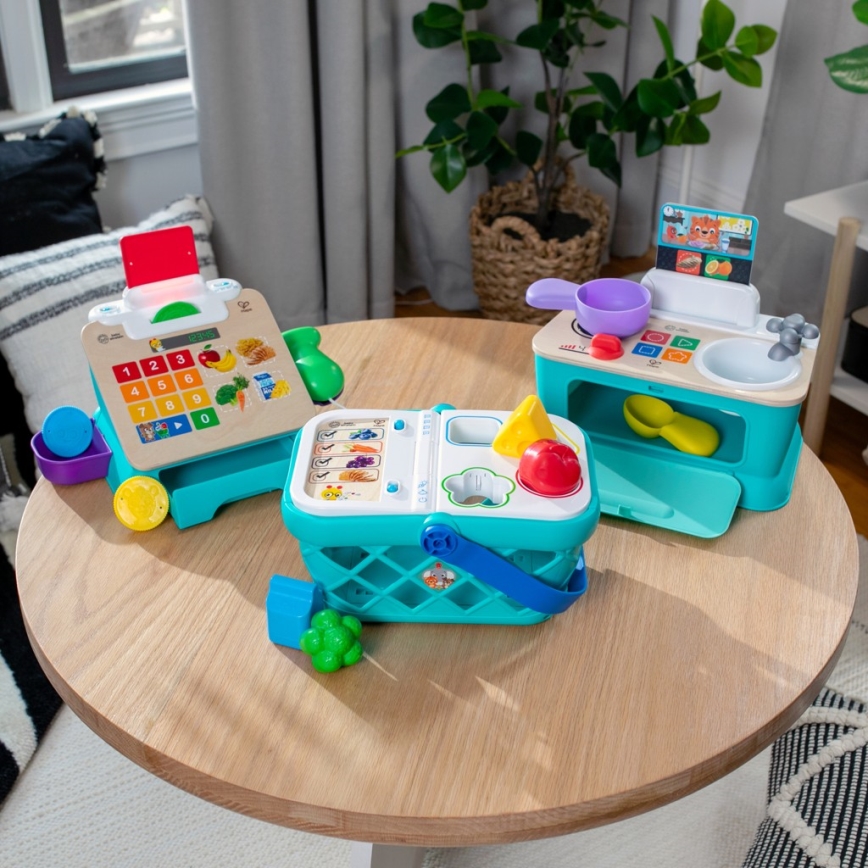 Baby Einstein - MAGIC TOUCH zenélő játékkonyha 3xAA