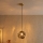 Kábellel függesztett csillár CRISTAL 1xE14/15W/230V sárgaréz/füstös fekete