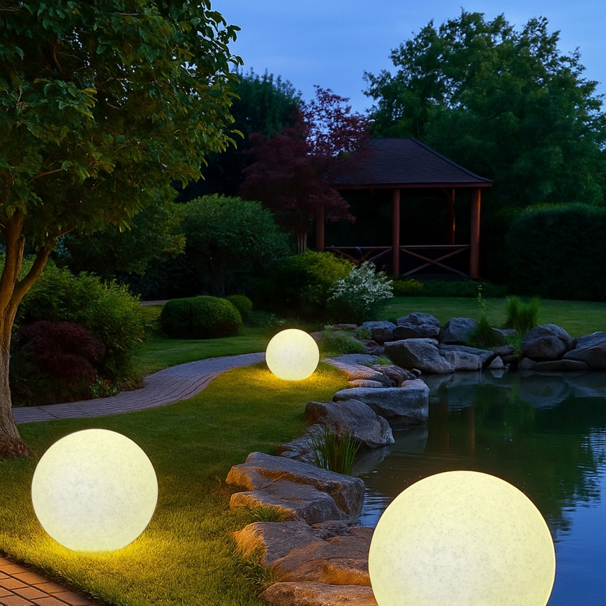 Kültéri dekoratív lámpatest LUMISTONE 1xE27/15W/230V IP65, átmérő 28 cm