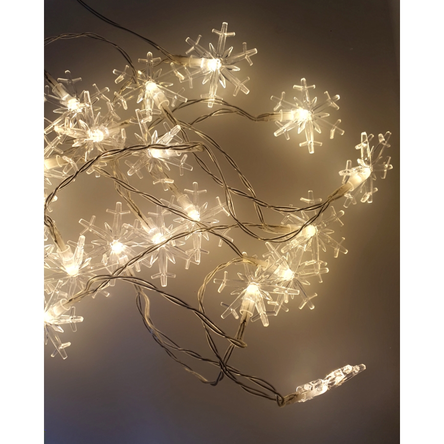 LED kültéri fényfüzér 20xLED/2xAA 2,2 m IP44 meleg fehér hópelyhek