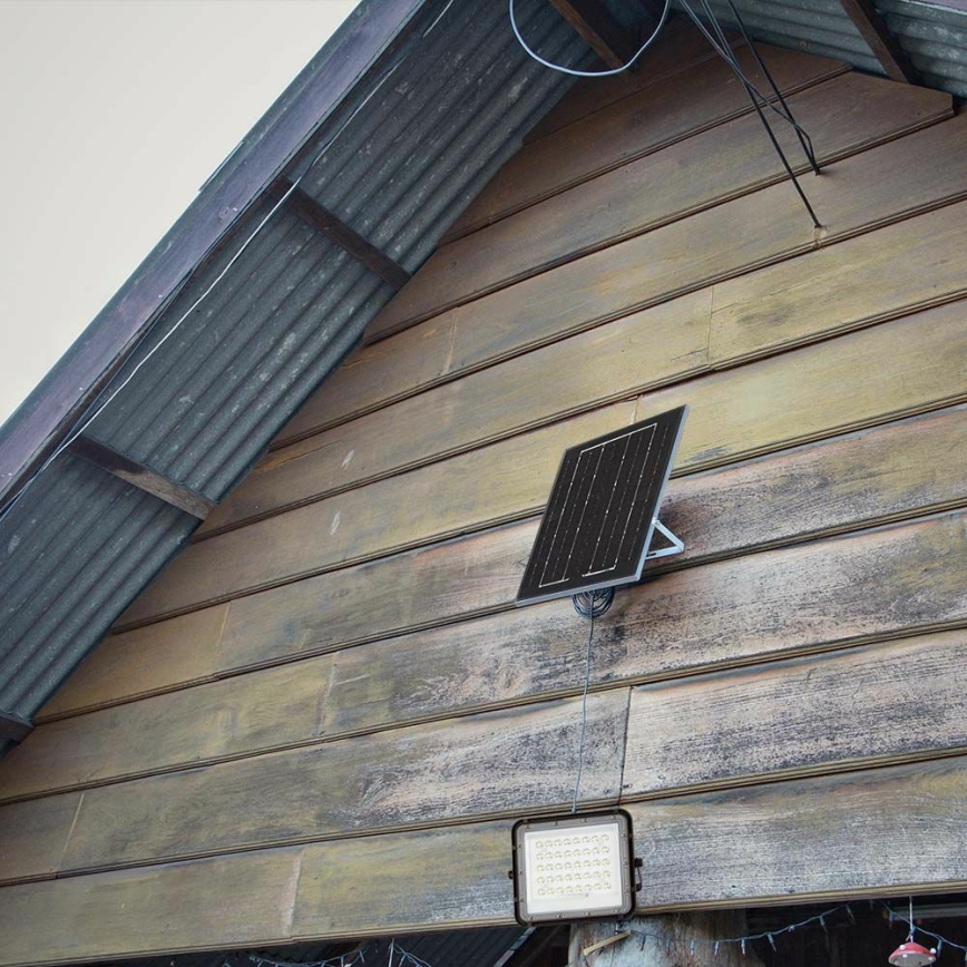 LED Kültéri dimmelhető napelemes reflektor LED/10W/3,2V IP65 6400K 6000 mAh fekete + távirányítás