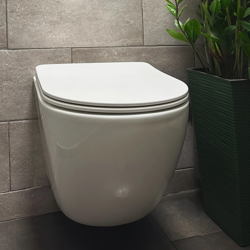 REA-C1259 - Fali WC ülőkével CARLO MINI TORNADO RIMLESS kerámia/fényes fehér